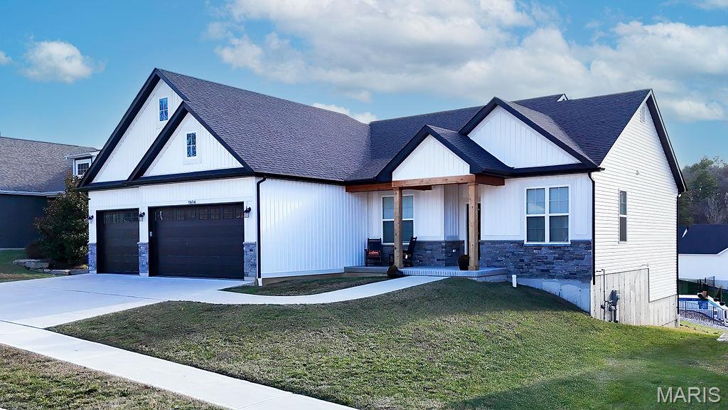 This newer built ranch home blends modern comfort with timeless curb appeal. A classic brick front anchors the exterior, offering a sense of permanence and warmth from the moment you arrive. Inside, a thoughtfully designed single-level floor plan flows effortlessly from room to room, featuring an open-concept living area ideal for gatherings or relaxed evenings at home. Large windows flood the space with natural light, highlighting the home’s clean lines and modern finishes throughout. The spacious great room opens seamlessly to the kitchen and dining area, creating a bright and inviting heart of the home. The kitchen is beautifully appointed with upgraded cabinetry featuring soft-close doors and drawers, high-definition countertops, a center island with seating, pantry, and modern lighting and hardware. Quality appliances and stylish finishes make this space both functional and visually striking. The private primary suite offers a comfortable retreat with generous closet space and a well-finished ensuite bath. Two additional bedrooms and a full bath provide flexibility for guests, family, or a home office. A convenient main-level laundry room adds everyday ease. Additional features include vinyl plank flooring, ceramic tile in both baths and laundry, six-panel doors with wide baseboard trim, insulated windows, architectural shingles, and a three-car attached garage. A full basement offers abundant storage and the opportunity for future finishing. This home is sure to impress! Motivated Sellers due to work transfer.