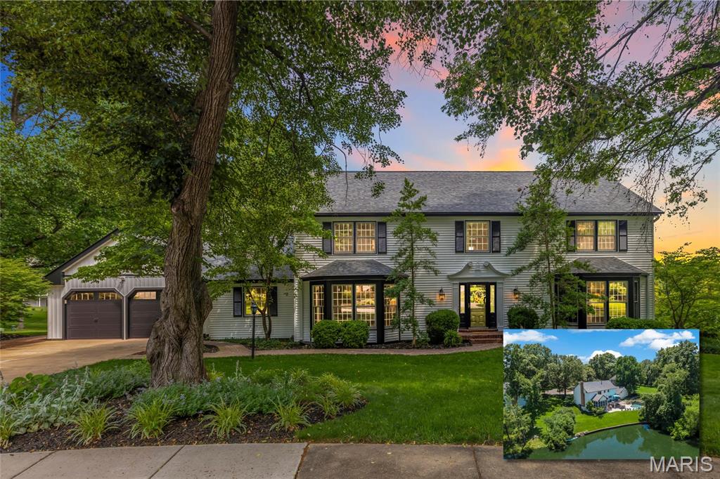 A rare opportunity to own an extensively updated lakefront retreat in sought-after Chesterfield Meadows, perfectly situated on a quiet cul-de-sac with breathtaking views of the subdivision lake and located within the award-winning Rockwood School District.

From the moment you enter, the home's elegant center hall foyer sets the tone with rich hardwood flooring, custom millwork, crown molding, and timeless architectural details throughout. Flanking the entry are gracious formal living and dining rooms filled with natural light, creating inviting spaces for both entertaining and everyday living.

At the heart of the home is a spectacular chef's kitchen designed for gathering and entertaining. Featuring custom ceiling-height gray cabinetry with glass accents, granite countertops, a large center island, custom subway tile backsplash, and premium KitchenAid stainless steel appliances including double wall ovens, a six-burner gas cooktop, and drawer microwave, this space combines exceptional style with everyday functionality. The adjoining family room offers a warm and welcoming atmosphere with a gas fireplace, built-in bookshelves, and recessed lighting. A formal office space is also found on the main level.

The finished walkout lower level expands the living space with a wet bar, full bath, and bonus sleeping room - perfect for overnight guests, recreation, or entertaining.

Upstairs, four spacious bedrooms include a luxurious primary suite and beautifully updated bathrooms, offering comfort and privacy for family and guests alike.

The true showpiece of this home is the extraordinary outdoor living experience. Enjoy morning coffee in the three-season sunroom, host summer gatherings on the expansive maintenance-free deck, or relax poolside while taking in tranquil lake views. The saltwater pool has been enhanced with a new PebbleTec® finish and is surrounded by expanded decking, creating a private backyard oasis that feels more like a resort than a residence.

Meticulously maintained and thoughtfully improved, recent updates include a new roof (2026), new siding (2026), upgraded 200-amp electrical service (2024), replacement fencing, maintenance-free deck replacement, maintenance-free screened porch flooring, expanded pool decking beneath the staircase, and new PebbleTec® pool surfacing.

Combining timeless design, modern updates, exceptional outdoor amenities, and one of Chesterfield's most desirable waterfront settings, this is a home where luxury, comfort, and lifestyle come together beautifully.