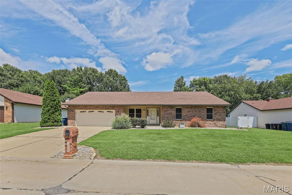 Move right into this 3 Bed/2 Bath, one-story home with plenty of space! Freshly painted interior and new wood laminate flooring flows throughout. Inviting front porch leads into the spacious Living Room. The open floorplan boasts a Family Room with a corner, brick-surround fireplace that flows into the Dining Room-with the perfect amount of space for entertaining. The Eat-in Kitchen is light and bright. Nearby Laundry Room, equipped with a washer and dryer, is convenient to the 2 car attached Garage. The Main Bedroom includes a walk-in closet and en-suite private Bathroom. 2 additional Bedrooms are large and have walk-in closet space, and share a Full Bathroom. Outside find a spacious deck and yard. This home is located on a low-traffic, tucked away street,  but convenient to restaurants, shopping, schools, medical facilities. transportation and highways. 2.75% assumable loan is available. Waterproofed and treated crawl space-2026. New sump pump-2026, New Roof-2026, HVAC-approx. 10 yrs., Disposal-2 yrs., Swansea occupancy compliant, several other inspections recently done and passed. Seller currently has a home warranty in place that can be transferred.. Call for your private viewing.