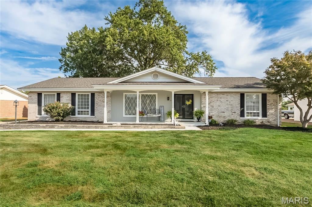 Ready to view in the popular Paddock Estates, this updated ranch backs to the 16th hole of the Florissant Golf Club!  Seller is working on a few more updates prior to showings starting likely first week of September.   Enter to ceramic tile foyer leading to hardwood flooring which leads through to Living Room, Dining Room and Kitchen.  The Kitchen offers stainless appliances, newer electric stove/oven and a coffee bar.  Family Room with newer slider out to large back patio, woodburning fireplace and that beautiful view! Primary Suite offers gorgeous french doors to back yard patio, spacious with hardwood flooring, two closets (one walk-in) and en suite Primary Bath.   Basement is a deep pour with a finished sleeping room. Roof was replaced in 2020.  Oversized two car garage offers parking space for your golf cart!