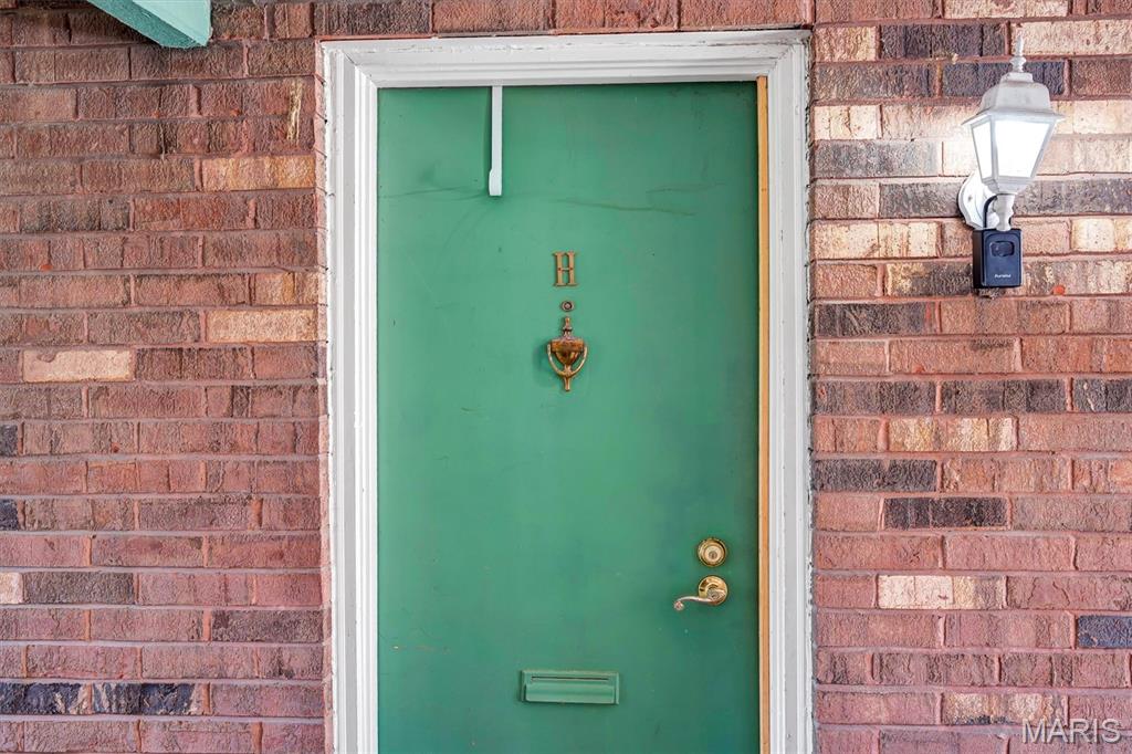 Welcome home to this charming 2-bedroom, 2-bath condo just minutes from the heart of Downtown Kirkwood! Offering nearly 900 square feet of comfortable living space, this bright and inviting unit features an open living area filled with natural light, elegant crown molding, and a private covered walk-out patio, perfect for relaxing or enjoying your morning coffee.

The kitchen features new quartz breakfast bar and updated lighting, adding a fresh, modern touch. The spacious primary suite includes a walk-in closet and an updated ensuite bath with ceramic tile flooring. A second bedroom and full bath provide flexibility for guests, a home office, or additional living space.

Additional conveniences include an assigned covered parking space and a private storage unit. Enjoy low-maintenance living in a fantastic location with easy access to shopping, dining, parks, and all that Downtown Kirkwood has to offer. Schedule your showing today!