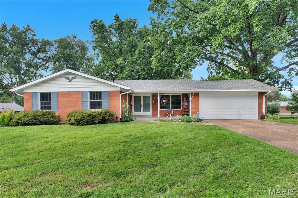Welcome Home to 5837 Oak Forest Lane!  Nestled in the heart of the A-Rated Lindbergh School District (Niche.com).  This Four-bedroom, 2 full Bath Ranch home is the one you have been waiting all summer for!  Lovingly maintained, this home has been in the same family since it was built.  Gracefully adorned on a quarter acre, corner lot in the Five Oaks subdivision, just off the Blues Highway (S. Lindbergh Blvd), convenient to everything South County has to offer.  Entering the home, you will be swept away by the beautifully refinished Hardwood Floors that grace the main level. The spacious Living Room flows seamlessly into the Dining area.  Step into the Eat-In kitchen with immaculate Oak cabinets, Stainless Steel appliances, Solid Surface counters, coffee bar and large Pantry.  Making your way down the hallway, you will find three generously sized bedrooms and full bath with double sink.  At the end of the hall is the Owner’s suite with Full, Private bath and Double Closets.  Heading downstairs to the Walk-out basement, you will find endless opportunities.  With two partially finished areas, perfect for that New Pool Table and Giant Flat Screen, you will be the envy of the neighborhood.  Couple that with a huge storage area, you’ll have plenty of room for all your tools and toys!  The two-car garage with newer insulated garage door and opener (2023) is just icing on the cake!  The home has a Passing St Louis County Occupancy Inspection, so all you have to do is figure out where to put your furniture.  Other updates include: HVAC System (2024); Radon Mitigation system (2024); Refinished Hardwood (2026); Roof (2019); Lateral Line repairs (2017); Vinyl Windows and 200 Amp Electric Panel. Don’t let this opportunity slip away!  Schedule your showing today!