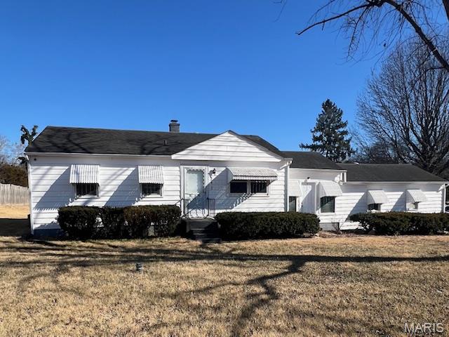 Were you waiting for summer to move into the perfect location?  Now is the time! Come take a look at this perfectly located house right across from the Festus R-6 school campus. You won't have to fight driving in any traffic to Festus events.  Just steps away from the track.  Walking the sidewalks can take you to local parks nearby too. This 3 bedroom 1 bathroom house is on a large corner lot.  Main floor laundry is easily accessible.  Extra bonus sunroom to use as a family room, play room, or dining room. Beautiful level back yard with a back yard grill.  Plenty of room to enjoy your yard or potentially build a detached garage, a pool, or whatever you can dream! Don't miss out on your opportunity to put your own touches on this charming house!