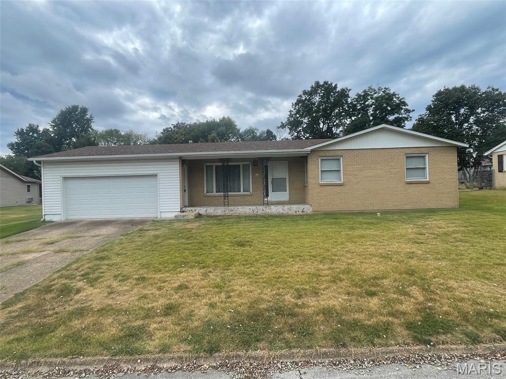Here is your opportunity at a solid starter home in the heart of Waynesville. This 3 bedroom 1 bath home is ready for a new owner to make it their own. The house sits on a quiet street in the middle of town where it is very close to the schools and all of the conveniences of town. Also, it is only about a ten minute drive to get into Fort Leonard Wood. This home is a one level ranch with very few stairs and features a new roof installed in July of this year. With the primary heat being on gas, the water heater being only a few years old, and a new roof, this home should provide years of worry free maintenance. Once you enter the home you will notice the openness of the living room into the kitchen providing a feeling of a much larger space. Best of all the backyard is fully fenced with a chain-link fence providing security and safety for your pets and or children. Schedule a showing today to see this well kept home, ready for it's new owners.