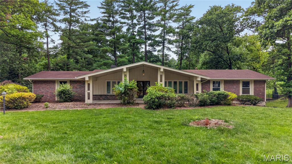 OPEN Saturday from 12-2pm. This sprawling ranch home sits on a large lot on a quiet no through street.  You'll appreciate the side entry attached garage and long driveway. The covered front porch opens to a large entry and formal living room and dining room. The great room features unique peg and plank wood flooring, lots of character with the hidden bar area, vaulted wood beams, natural light, and a brick fireplace.  Walk out to the deck overlooking the backyard and enjoy your morning coffee. The large kitchen features plenty of cabinetry, center island, and breakfast room. Convenient main floor laundry. Gorgeous hardwood flooring throughout the hallway and all 4 bedrooms. The primary suite features a full bathroom and large walk in closet. The other 3 bedrooms are very generous in size as well. The massive lower level is partially finished with a large recreation room and a ton of possibilities for future uses. Excellent location close to hospitals, schools, shopping, restaurants, highways and more. Property is being sold in "as is" condition. Buyer will be responsible for obtaining the occupancy permit.