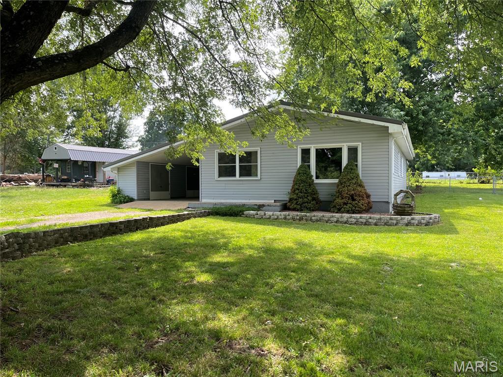Tidy 3 bedroom, one bath home just north of Pilot Knob, Mo. Home has been well maintained and move in ready.  Nice fenced yard and large carport with storage. Would make great starter home or would work well for retirees.  Good well and new engineered septic system, large utility room/mud room make this a great place to call home...