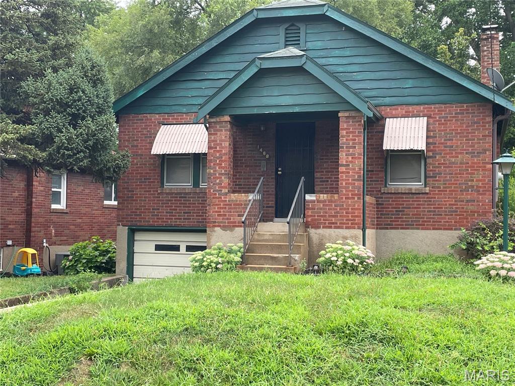 Charming 2-bedroom, 1-bath brick bungalow in Pagedale, ideal for a first-time buyer or investor. The home features a tuck-under garage, a spacious level backyard perfect for entertaining or play. This property is being sold as-is, the seller will make no repairs or provide inspections. Priced for a quick sale, this property offers a great opportunity to add your personal touch and maximize its potential.