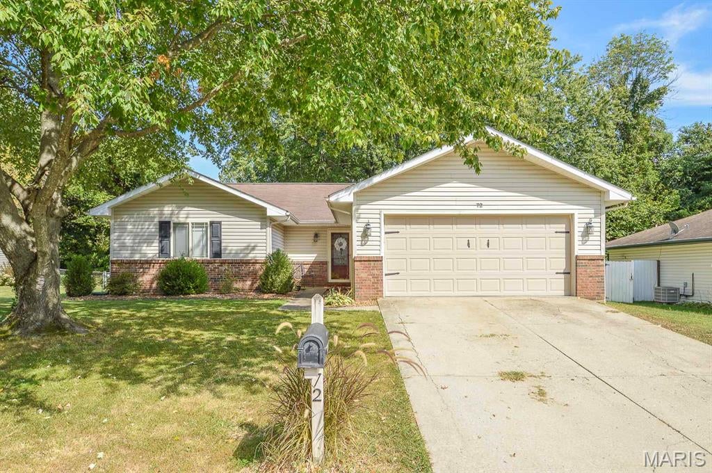 Spacious Ranch Home with Open Floor Plan & Fenced Backyard!

Welcome home to this spacious 3-bedroom, 2-bath ranch offering a comfortable open floor plan and plenty of features to love! The vaulted living room creates an inviting sense of space and features wood laminate flooring, skylights, and a cozy wood-burning fireplace. Double doors open directly to the backyard, making indoor-outdoor living and entertaining a breeze.

The kitchen is both functional and stylish, featuring ceramic tile flooring, stainless steel appliances, and updated countertops and cabinetry. All three bedrooms offer generous space, while the primary bedroom provides the added convenience of a private en-suite bath.

Step outside onto the back deck and enjoy the privacy of the fully fenced backyard which is perfect for relaxing, entertaining, or enjoying your morning coffee.

Conveniently located near shopping, restaurants, Scott Air Force Base, and interstate access, this home combines comfort, convenience, and value in one great package.

Don't miss your opportunity to make this inviting ranch your new home—schedule your showing today!