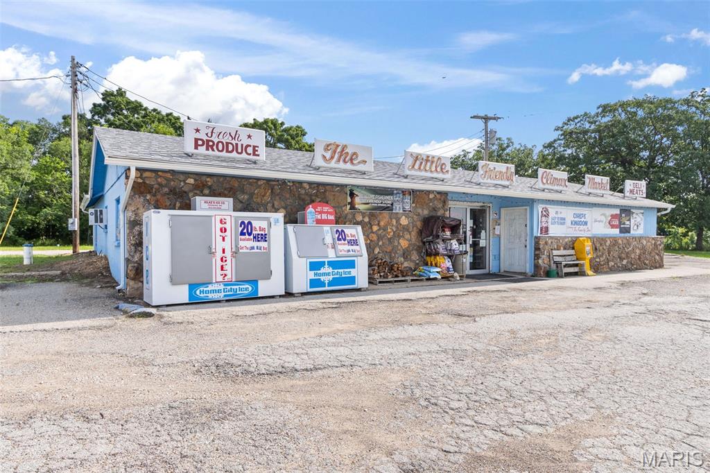 Turnkey Highway-Front Grocery Store plus extra on 2.2 Acres located in the Heart of Climax Springs MO! Incredible opportunity to own a fully operational, turnkey grocery store with unbeatable highway frontage between Camdenton & Warsaw! This established hometown grocery store has served the community for decades and includes over $100,000 in inventory for a seamless transition to the next owner. Situated on 2.2 flat acres with high visibility, the property features a 2 year old roof and gutters, ample parking, additional storage in a 30x20 shed. The backroom includes a walk in cooler for easy inventory management. Also included is a 3 BR 2 BA manufactured home with a fenced yard-perfect as a residence, rental, or continued vacationing customers. A rare investment with strong community roots, business potential, and live on site flexibility. Don't miss this chance to own a piece of small-town legacy!