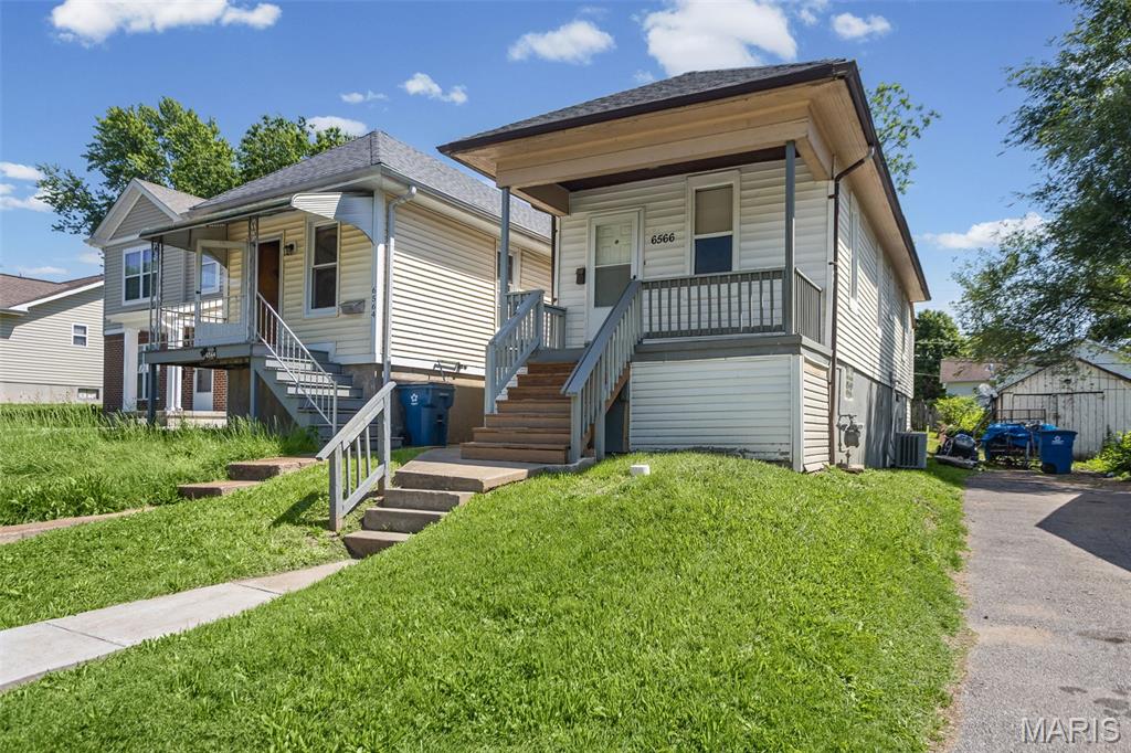 Why pay rent on someone else's home, when you can own this adorable home of your own! Recently remodeled one bedroom, one bath home, with bonus room, kitchen, living room, and off street parking in the back. The unfinished basement has a large built in closet, and can be extra storage space, family room or office (or all 3). The covered front porch is perfect for hanging out on those nice evenings. Great location with a city park across the street, and a quick drive or bike ride to Forest Park. Blocks from U City and all the restaurants, shops and entertainment it has to offer. Schedule your showing today!