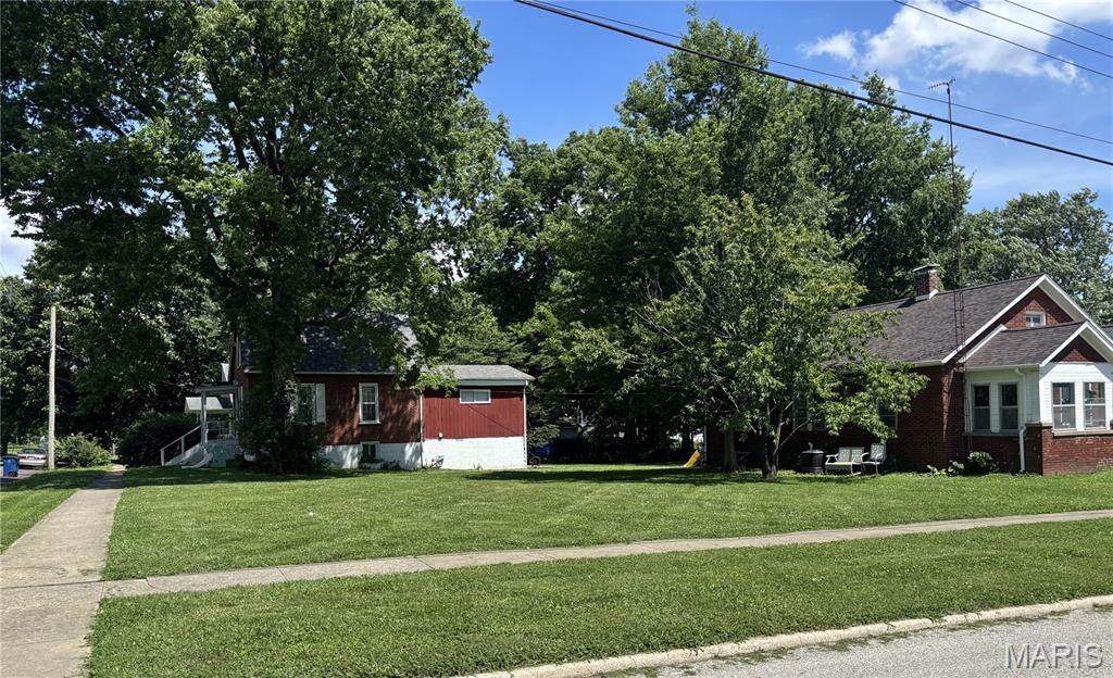 Nice corner lot in an established neighborhood ready for your next home build.  Great corner lot close to town and University, this would be a great place to put your next home.  All utilities available onsite.   Lot dimensions are 62x66.  Drive by it when you can.