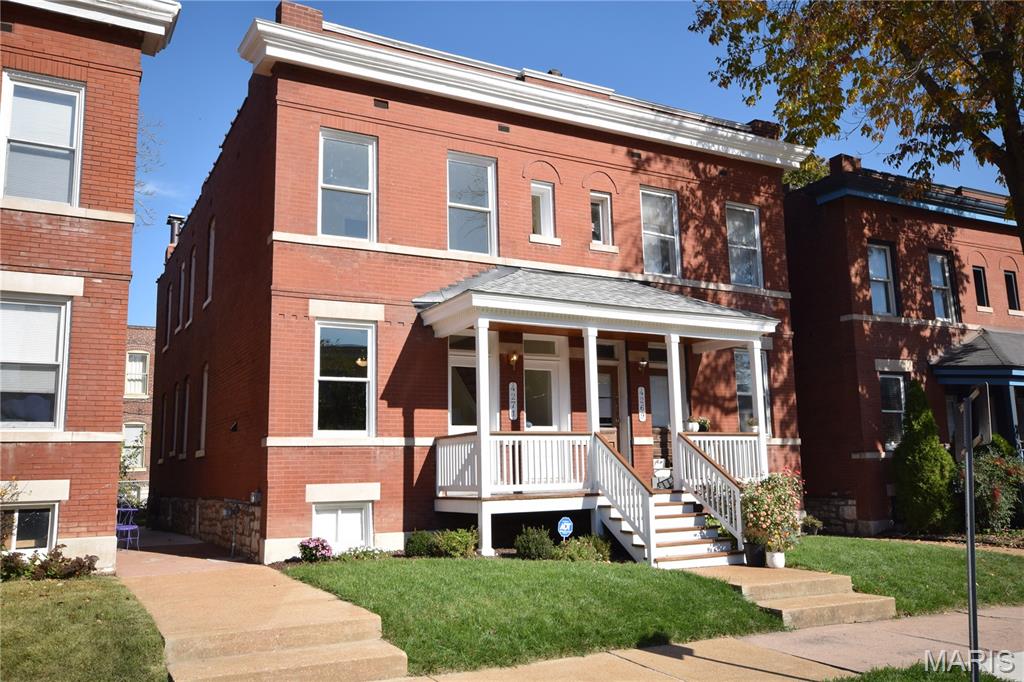 This fee simple town home has been meticulously renovated over the past several years with attention to detail and respect for its history. Enter into the spacious living room with a cozy gas fireplace and a convenient coat closet. The classic large dining room is perfect for holiday entertaining or casual dining. The first floor full bath is all new. The kitchen has all new appliances including a washer and dryer in a separate laundry closet. There is also a pantry and an additional back staircase with custom wood railing. Notice the beautiful engineered wood flooring in the kitchen and hallway. The floors have been refinished in most rooms revealing the original character. Upstairs you'll find three bed rooms with new doors and a brand new full bath with a large shower. All the textured ceilings were refinished and repaired to beautiful a smooth finish. Newer windows, new electric service and wiring, newer water lines and PVC sewer service. You will notice quality work and fresh paint throughout. The basement contains a new water heater and high efficacy HVAC. The basement is clean and dry and ready for your storage and or workshop. All the ducts and furnace were recently professionally cleaned and serviced. The back yard with fresh grass, bushes and plants is a pleasant area to hang out. The exterior was recently spot tuckpointed.  The front porch was rebuilt including a new porch roof and deck. The walkway has freshly poured concrete to the back.  Have your agent schedule a tour to see this property, you will not be disappointed. The location is City Living perfection and very convent to all your needs. Located a few steps from world-renowned Missouri  Botanical Garden and walking distance to many fine restaurants. There is a new bike/walking path on Tower Grove Ave. currently being constructed that will eventually take you to Forest Park. First available this Friday 11/8 after 10:00 AM