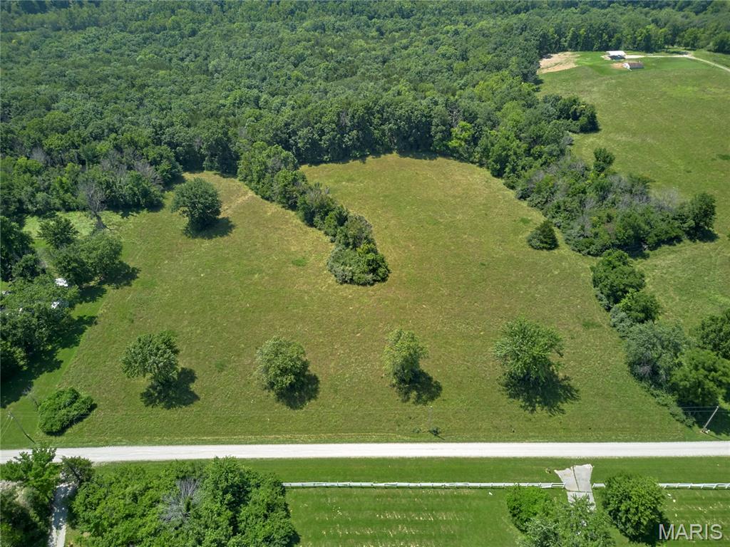 Unrestricted acreage in Lincoln County! Build your dream home on this beautiful 6 +/-acre property! This parcel features mostly open, gently rolling ground in a peaceful country setting. There is plenty of space for a homesite, outbuildings, animals, or simply room to enjoy the outdoors. With no known restrictions, you'll have the freedom to create the lifestyle you've been looking for. Whether you're ready to build now or invest for the future, this scenic acreage is full of possibilities. This parcel is being split from a larger parcel. See "Exhibit A."  Seller is in the process of surveying the property. Final acreage, legal description, and property boundaries are subject to the completed survey.