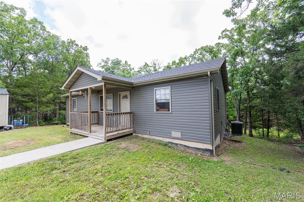 Looking to live in a private lake community? This recently built 3-bedroom, 2-bath home is nestled in the private community of Peaceful Valley Lake. This home has it all, featuring a spacious open floor plan, walk-in pantry, breakfast bar in the kitchen, and a primary suite complete with a walk-through closet and private bath/laundry area. When you walk in, the first thing you’ll notice is the high vaulted ceilings that really open up the space.

If you’re curious about lake life, Peaceful Valley Lake offers plenty of amenities, including a 185-acre lake, beach areas, tennis courts, clubhouse, picnic areas, campgrounds, playground, and community pool. Whether you enjoy fishing or spending time out on the water in your boat, come check out everything this home has to offer.