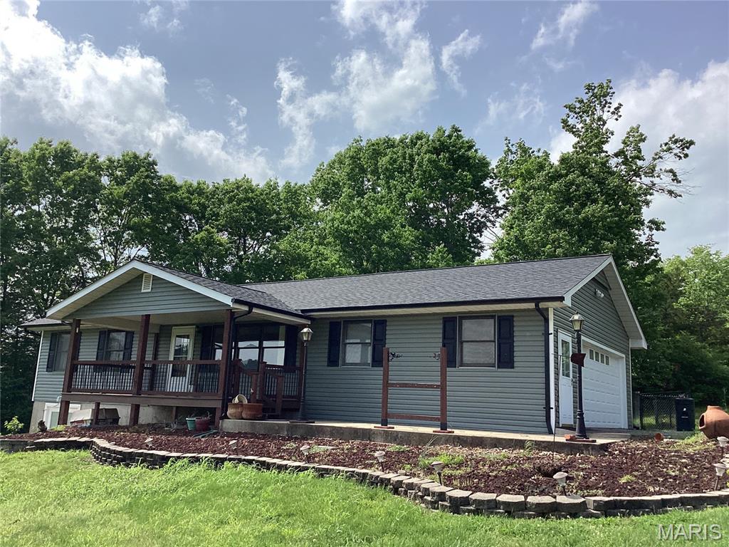 Ranch home sitting on 1 acre, panoramic view of Lake, vaulted living room, center island in kitchen, full walk-out lower level with Family room, gas fireplace, 1/2 bath, office & bonus room, washer & dryer to stay, NEW Roof, Vinyl Siding, NEW Gutters & Guards, ALSO attic fan, water softner, maintenance free decking on front porch, fenced back yard, shed, You Can Not appreciate a Home without making an appointment, Thanks