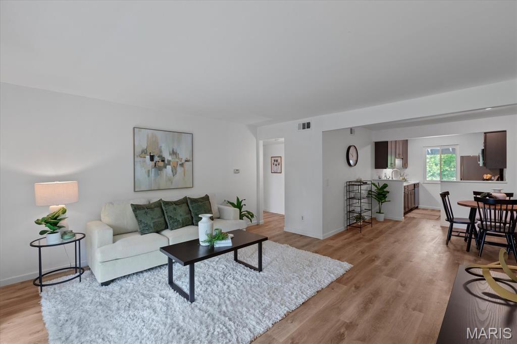 Welcome to easy lake living in the heart of Lake St. Louis! This beautifully updated 2-bedroom, 1-bath condo combines modern style, low-maintenance living, and an unbeatable amenity package. Inside, you’ll find brand-new luxury vinyl plank flooring, a fully renovated kitchen, fresh paint throughout, and a bright, inviting layout designed for everyday comfort. Step onto your private balcony overlooking the pool and playground—perfect for enjoying your morning coffee or relaxing at the end of the day. Residents enjoy access to an incredible array of amenities including two pools, boating, fishing, Lake St. Louis privileges, golf, tennis, sand volleyball, walking trails, and a stunning clubhouse, creating a true resort-style experience. Whether you’re searching for your next home, a weekend retreat, or a turnkey investment opportunity, this property offers exceptional value in one of the area’s most desirable communities. Investors take note: a rare opportunity exists to purchase multiple nearby units from the same seller, offering potential portfolio expansion, operational efficiency, and added long-term value. Enjoy the perfect combination of lifestyle, location, and investment potential—schedule your showing today and discover why every day in Lake St. Louis feels like a vacation.