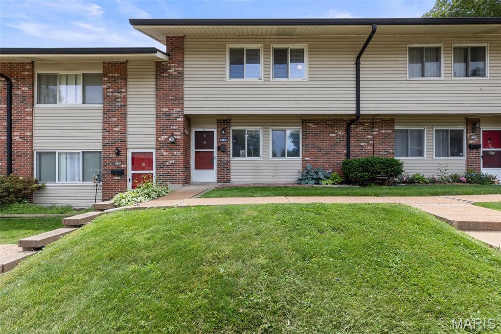 Beautifully updated 2-story townhouse offering the perfect blend of space, style, and convenience! Featuring 4 spacious bedrooms and 1.5 baths, this move-in-ready home is located in a desirable community just minutes from Highways 55, 255, and 270, making commuting, shopping, dining, and everyday errands incredibly convenient.
Step through the welcoming entryway into an amazing open floor plan designed for comfortable living and entertaining. The spacious living room is filled with natural light and features an open staircase leading to the upper-level bedrooms, creating an airy and inviting feel throughout the main level. A center hallway flows seamlessly into the kitchen and breakfast room, offering both functionality and charm.
The beautifully updated kitchen is sure to impress with its rich cabinetry, gleaming granite countertops, decorative tile backsplash, breakfast bar seating, double sink, updated sconce lighting, and upgraded sliding glass door providing easy access to outdoor space. Whether preparing meals or hosting guests, this kitchen offers the perfect setup for everyday living.
Upstairs, you’ll find four generously sized bedrooms with updated flooring installed in 2024, providing fresh modern appeal. The home has been thoughtfully maintained and extensively updated over the years, giving buyers peace of mind and added value. Major improvements include all lighting fixtures replaced in 2020, new air conditioner in 2022, upgraded electrical panel and added heat pump in 2023, new water heater in 2023, updated kitchen and bathroom faucets in 2023, new stove in 2024, replaced closet doors in 2024, and brand-new living room flooring installed in 2026.
This home offers an incredible opportunity to enjoy low-maintenance living with stylish updates, generous living space, and a prime location close to major highways, parks, restaurants, and shopping. A fantastic combination of comfort, updates, and convenience this one is ready for its next owner to move right in and enjoy!