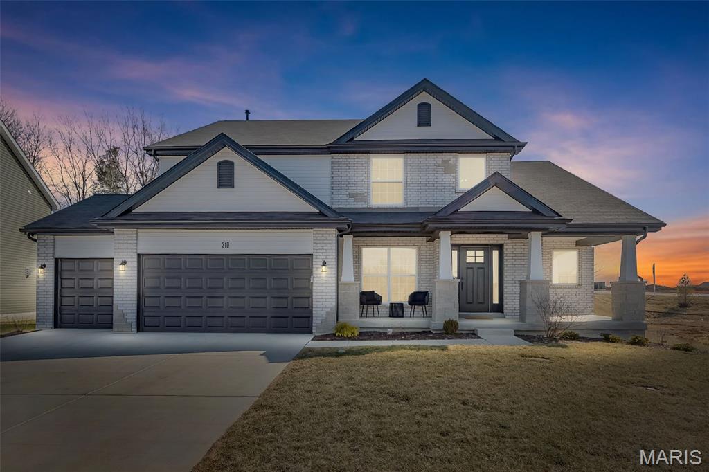 Why wait to build when perfection is already here? This stunning, just two-year-old 1.5-story home in the heart of Lake St. Louis offers nearly 3,500 square feet of beautifully designed space — and it shows like a model home. From the moment you step inside, you’re greeted by a breathtaking wall of windows that floods the home with natural light and frames a private, tree-lined backyard — the perfect blend of elegance and tranquility. The heart of the home is an entertainer’s dream. The expansive kitchen features a massive center island, gleaming quartz countertops, stainless steel appliances, double ovens, a 5-burner gas cooktop, 42-inch cabinetry, and an oversized walk-in pantry that will make you rethink storage. Whether hosting holidays or casual weekends, this space was designed to gather. Just off the kitchen, you’ll love the thoughtfully designed mudroom with built-in drop zone and an impressively large laundry room — because function should be just as beautiful as form. The main-floor primary suite is a true retreat. The spa-inspired ensuite offers a soaking tub, separate shower, double vanities, private water closet, and an enormous walk-in closet that feels more like a dressing room. Upstairs, the layout continues to impress with a generously sized bedroom featuring its own private ensuite — ideal as a second primary suite or guest retreat. Two additional spacious bedrooms share a well-appointed Jack-and-Jill bath, offering comfort and privacy for family or visitors alike.Immaculate. Barely lived in. Loaded with upgrades. This is the one you have been hoping to hit the market — without the wait, stress, or added cost of new construction. Eight years remaining on the builders warranty. Open house Sat. 6/20 from noon-2pm.