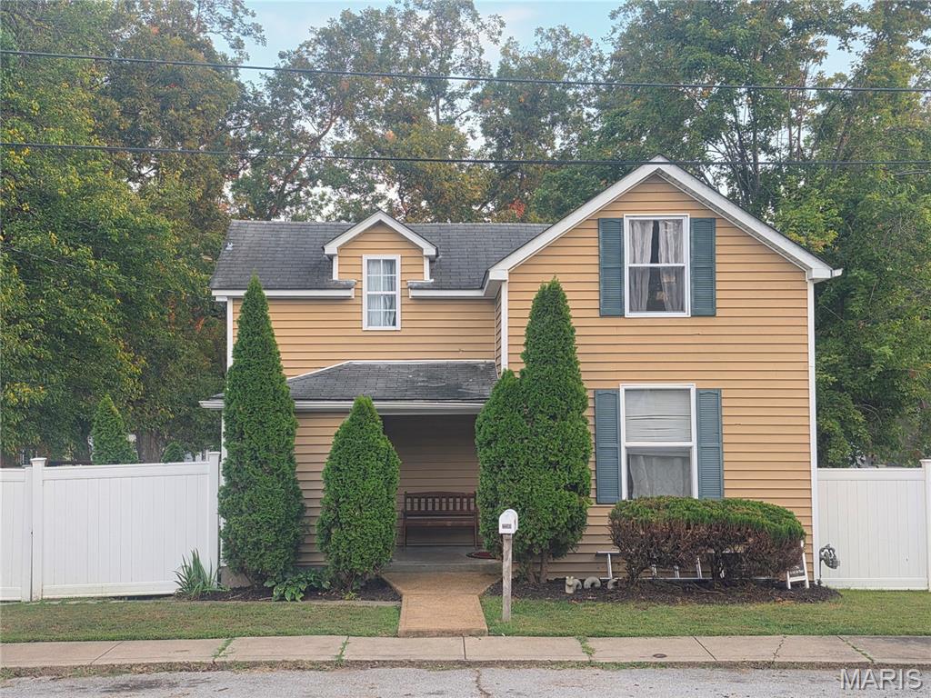 Beautifully and recently updated 3-bedroom, 2-bath home in Historic Ste. Genevieve! The main floor features a spacious primary bedroom with adjoining full bath and a large walk-in closet. An open-concept living room and a gorgeous kitchen with granite countertops and cabinetry along with separate dining area and main floor laundry/mudroom provide plenty of convenience, with direct access to a relaxing deck that overlooks mature trees and a level yard with privacy fence—perfect for outdoor enjoyment and privacy. Upstairs, you’ll find two additional bedrooms and a full bath, offering the perfect layout for family or guests. This home blends historic charm with modern style, giving you the best of both worlds. New roof just installed. Schedule your showing today—you’ll fall in love with this move-in ready beauty!