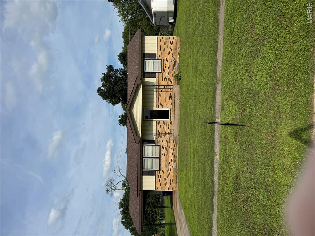 Great affordable, starter home in an established neighborhood.  3 bedrooms, 1 bath.  1 car carport with attached storage.