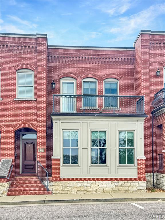 This luxury townhome offers an unbeatable location on West Front Street with breathtaking views of the Missouri River. Enjoy easy access to the riverfront walking trail, park, restaurants, shopping, and local festivals—everything right at your doorstep.
From the moment you enter, this home impresses with a spacious, welcoming foyer featuring built-in cabinetry, elegant pillars, and a convenient coat closet. A beautiful staircase leads to the second floor, while the main level showcases an open-concept design perfect for both everyday living and entertaining. Relax in the front sitting area and take in the river views, or gather in the inviting living room. The stunning kitchen features a large granite island, custom cabinetry with pull-outs, stainless steel appliances, and flows seamlessly into a generous dining area with access to the covered back porch. Just off the kitchen, you’ll find a spacious walk-in pantry, additional storage, a powder room, and access to the one-car garage.
Upstairs, a wide hallway with crown molding leads to the luxurious primary suite, positioned at the front of the home to capture incredible river views from its private deck. The en-suite bath offers a large tiled walk-in shower, double vanity, and two walk-in closets—one in the bedroom and one in the bath. Two additional bedrooms complete the upper level, one with access to a deck, along with a full hall bath and a large laundry room features a sink, cabinetry, and extra closet space. There could be potential for an elevator if desired.
Don’t miss this rare opportunity to own a beautiful Missouri River view townhome in a prime location!