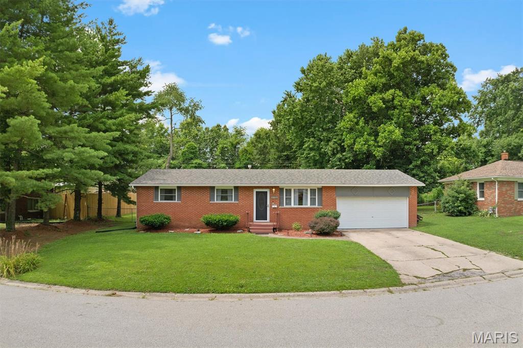 This ranch home is THE ONE! Don't let its size deceive you. This beautifully maintained 3-bedroom, 1.5-bath 3/4 brick ranch offers the comfort and convenience of highly desirable single-level living with true main-level laundry. The primary suite includes its own private half bath, adding comfort and functionality. From the moment you arrive, you'll appreciate the inviting curb appeal, attached garage, and beautiful level, mostly fenced backyard, perfect for entertaining, pets, gardening, or simply relaxing outdoors. Inside, you'll find a bright, functional floor plan featuring updated finishes, durable LVP flooring, and the ease of main-floor laundry that today's buyers love. Recent improvements, including a new roof in 2024 and a new water heater in 2026, provide added peace of mind and make this home truly move-in ready. Whether you're a first-time buyer, looking to downsize, or simply searching for an easy-to-maintain home, this property offers the perfect combination of comfort and practicality. Schedule your private showing today and discover why you will love where you live!