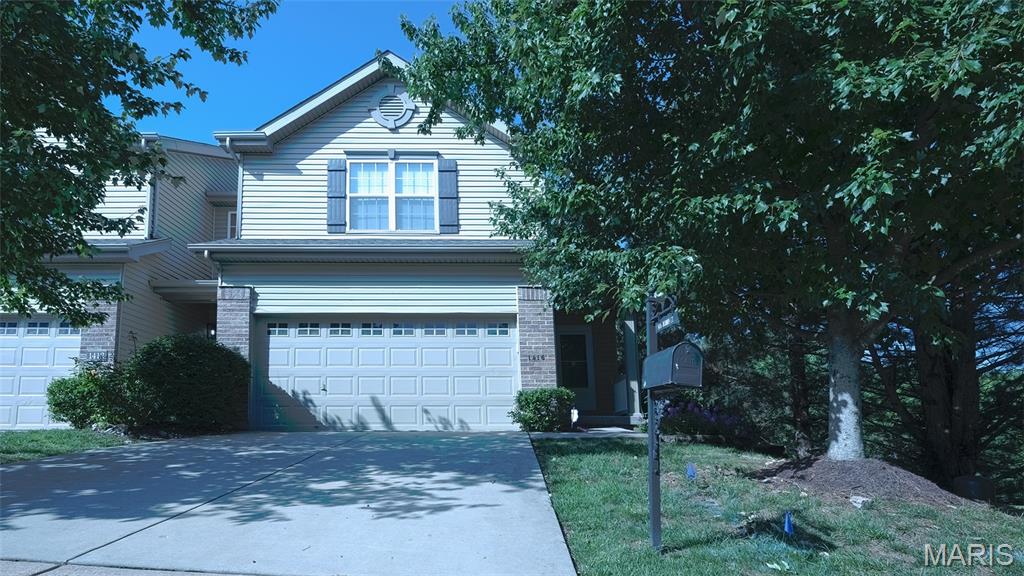 Welcome to this well-maintained end-unit villa in the desirable Forder Heights community! One of the best locations in the neighborhood, this home offers exceptional privacy with open space behind and beside the property. A new roof was installed in 2025, providing added value and peace of mind. The spacious deck and walk-out lower level offer great outdoor living and entertaining space. The open floor plan features a bright great room with a gas fireplace, hardwood flooring on the main level, a breakfast bar, and second-floor laundry. The upper level includes a vaulted primary suite with a walk-in closet and private bath, along with two additional bedrooms and another full bath. The partially finished walk-out lower level includes a full bathroom and flexible living space perfect for a family room, recreation area, home office, or guest space. Conveniently located near Highways 55 and 270, shopping, restaurants, parks, and schools. Don't miss this opportunity to own one of the best-located homes in Forder Heights!
