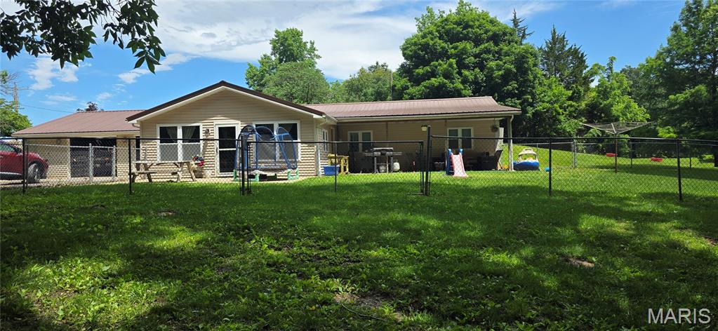 Just outside of Steeleville, this one checks a lot of boxes if you are looking for low utility bills, 2.5 acres of country living, 3-bed, 2-bath, fenced side yard, two car garage and pole barn! This Berm (earth) home is updated and ready to move into. Electric bill is low, and with the well and septic tank, there is only one utility bill. More pictures and drone footage will be available on Friday/Saturday. This one is priced to sell (and at appraisal value). Don't let it slip away; call for a showing today!  Due to overwhelming interest, seller is asking for all offers to be submitted through Tuesday, June 9 and will review all on Wednesday, June 10.