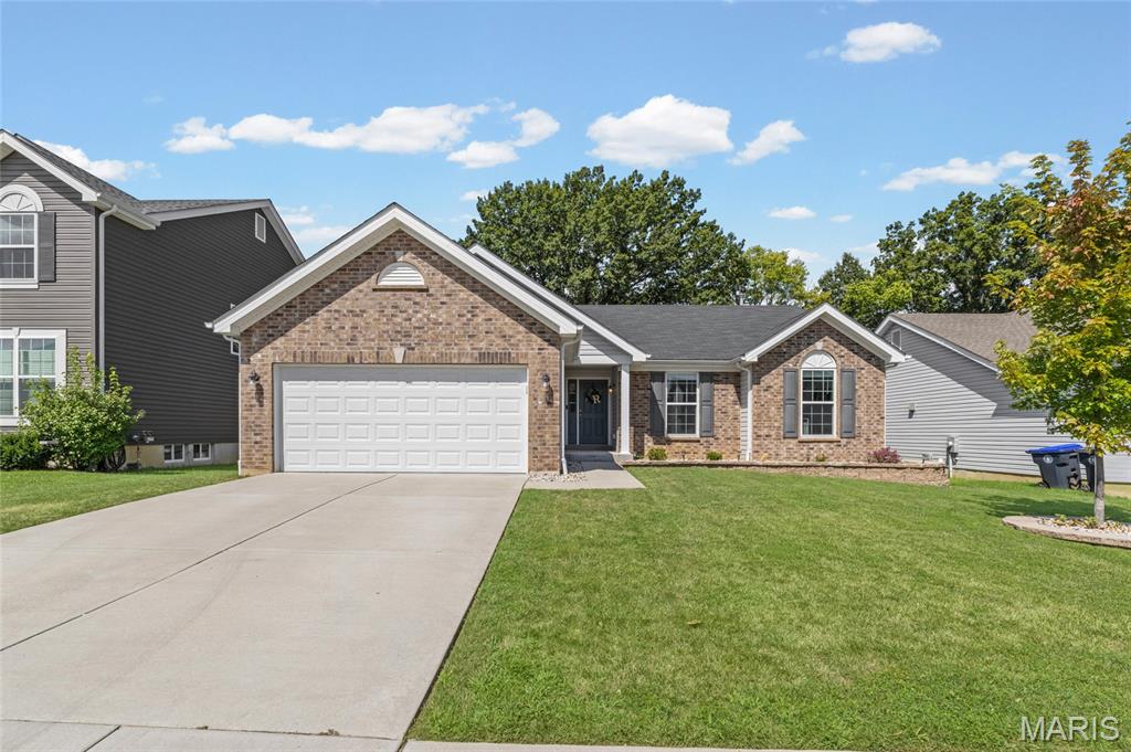 Live where O'Fallon works, grows, and puts down roots. Welcome to 811 Crestwood Ct. in the Ft. Zumwalt School District. This 5 year old home pairs modern finishes with everyday convenience you're looking for. Step inside to a bright, inviting, kitchen featuring crisp white cabinetry, granite countertops, stainless steel appliances, and plenty of space to cook, gather, and entertain. The primary suite offers a comfortable place to recharge, complete with a walk-in closet and private en suite featuring a double bowl vanity. Out back, the pergola creates the perfect setting for morning coffee or weekend grilling while the fenced in yard is perfect for pets or children. Tucked into a cul-de-sac while just minutes from everyday shopping, dining, and convenient access to highway 70, this home makes it easy to stay connected to everything O'Fallon has to offer. Modern, comfortable, and conveniently located- 811 Crestwood Ct. is ready to welcome you home.