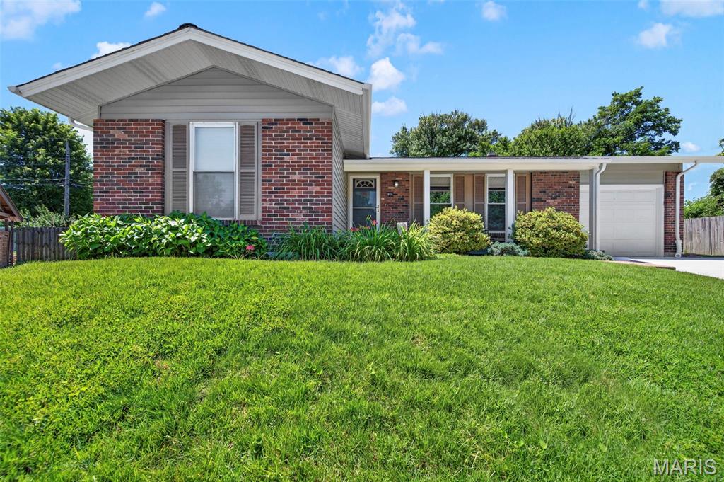Looking for an affordable home in the award-winning Lindbergh School District? Here you go. Welcome to 506 Aspen. This 3-bedroom, 2 bath ranch is ready for its new owner. As convenient to transportation and shopping as you'd ever desire. On arrival, note the outstanding curb appeal with full brick elevation, lovely landscaping along with the recently updated extra wide driveway. Upon entering you'll be impressed by the spaciousness of the rooms. Amble from the Living Room with lots of natural light to your roomy combo Dining/Family Room with woodburning fireplace. This layout is extremely flexible and can be configured to be used whatever way suits your specific needs. The family chef will love the kitchen. You'll find loads of cabinets, ample counter space. gas range, built in microwave and even a handy center island for meal prep, entertaining or those meals on the run. Let's check out the bedrooms. Appreciate the beautiful hardwood floors, ceiling fans and great colors. The primary bath has been updated. The adult height bathroom vanity is a definite plus. Come on downstairs to the lower level just waiting for your finishing touches. Or leave it like it is. Awesome storage and room to create your own usable space. Wait. There's more!  This back of cul de sac lot is nearly 1/3 of an acre. Really. Enjoy the fully fenced back yard and partially covered patio area. Just in time for Bar B Que season. I'm smelling pork steaks! Add in the newer roof, siding, gutters, downspouts and soffits (2024), updated ceilings - no popcorn in most rooms, newer ceiling fans (2024) and driveway update (2026) and I'm confident you'll agree that 506 Aspen is a winner. Come visit today. You won't be disappointed!