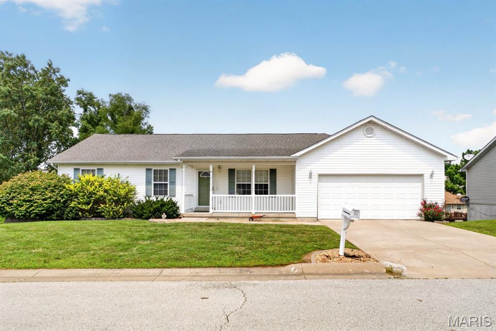 Welcome to 819 Tiffany Court, a clean and inviting ranch offering convenient one level living. This home features 3 bedrooms, 2 full bathrooms, main level laundry, and an open living and dining area filled with natural light. The kitchen includes ample cabinet space, stainless steel appliances, and access to the back deck overlooking the level yard. The primary bedroom offers a private full bathroom, while two additional bedrooms provide flexibility for guests, an office, or hobbies. Downstairs, the full unfinished walkout basement offers generous storage, a bathroom rough in, and plenty of potential for future finished living space. An attached two car garage completes the home. Conveniently located in Marthasville and served by the Washington School District. Home is being offered as is.