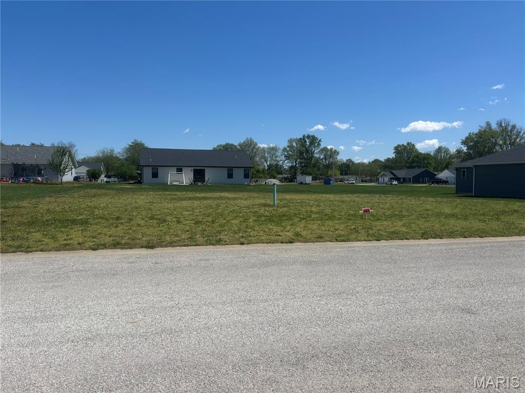 Your dream home starts here! This ready-to-build lot nestled in Old Town Estates — the newest and only subdivision in Germantown, IL — is your opportunity to put down roots in one of the area's most exciting new communities. Priced at just $46,000, this is an incredibly affordable entry point to build the home you've always envisioned. All utilities are available, and city water and sewer are already in place, so you can break ground without the hassle or added expense of well and septic installation. Located in the charming small-town community of Germantown, you'll enjoy a peaceful setting with convenient access to the Metro East corridor. Lots like this don't last — secure your slice of Old Town Estates today