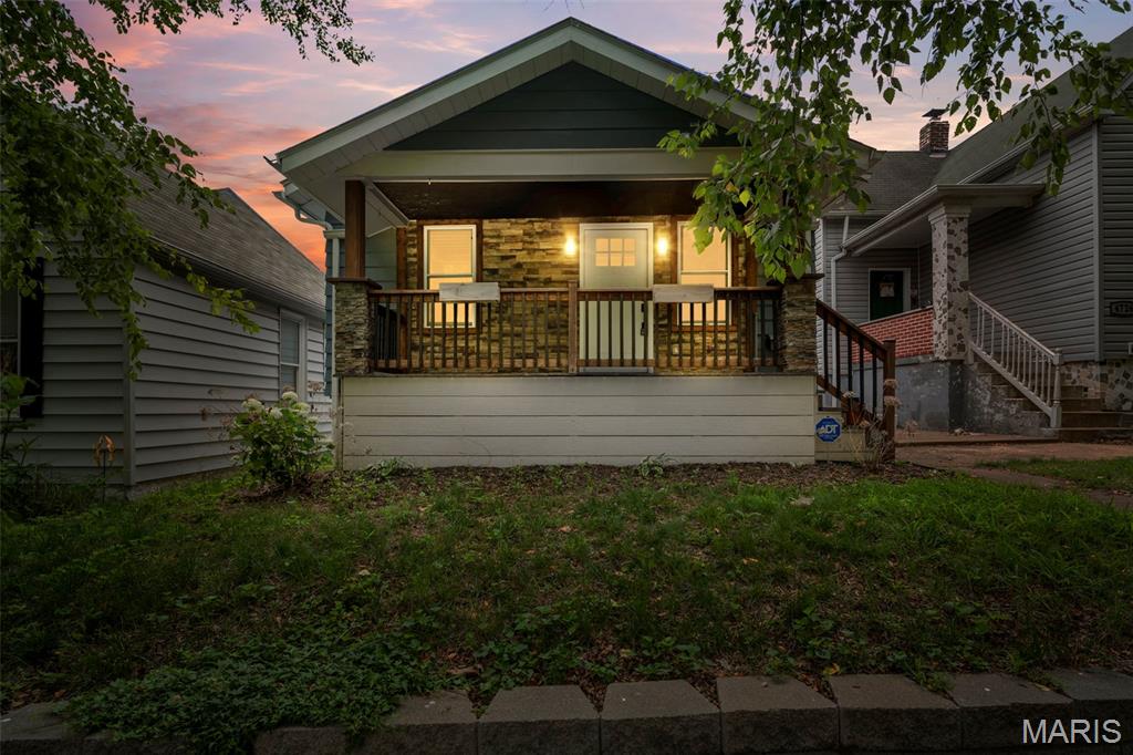 Welcome to this beautifully rehabbed bungalow in the heart of Princeton Heights! From the moment you arrive, the inviting covered front porch sets the tone — the perfect spot to sip your morning coffee and wave to the neighbors. Step inside to a bright, open living and dining room that flows effortlessly and is perfect for both relaxing and entertaining. The crisp, updated kitchen has everything you could want — gorgeous butcher-block countertops, a convenient breakfast bar, plenty of storage, and tons of natural light. It's as functional as it is beautiful. Just wait until you see the spa-like bathroom with beautiful tilework and a rainfall showerhead.  The two bedrooms are thoughtfully split on opposite sides of the home, giving everyone their own private space. Step out back to your covered patio overlooking the fully fenced yard — ideal for summer cookouts, pets, and play. The 2-car garage gives you all the parking and storage you need. Christy Park and all the best of South City are just a short walk away; you'll love everything this location has to offer. 4724 Hummel is truly a special home - updated and move-in ready, the only thing this home is missing is you!