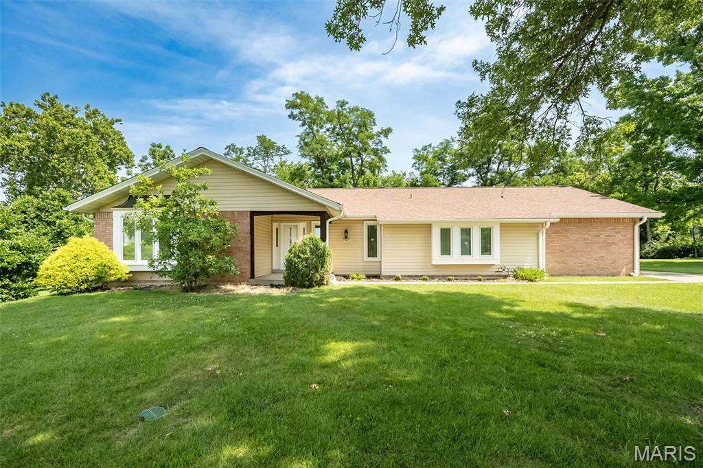 This beautifully maintained 4-bedroom ranch offers the perfect blend of comfort, style, and location. Nestled on a quiet cul-de-sac and backing to mature trees, you'll enjoy exceptional privacy in the fenced backyard. The updated kitchen and remodeled bathrooms provide modern finishes and move-in-ready appeal. One of the bedrooms has been thoughtfully converted into a convenient main-floor laundry room, offering added functionality while still allowing flexible living space. The sunken family room features a cozy gathering area with a second access point to the patio, creating a seamless connection to outdoor entertaining. Located in the highly desirable Parkway School District and just minutes from shopping, dining, parks, and major highways, this Ballwin home offers an outstanding combination of peaceful surroundings and everyday convenience.  For convenience, the seller prefers to sell the property "as is".  Appliances are negotiable along with some furnishings.