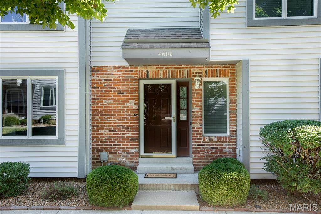 Two bdrm, 2.5 bath Townhouse. Family rm w/ built in shelving & 2 lower pull out shelves w/ doors plus newer carpeting. Fully remodeled Kitchen & dining rm includes hand made custom cabinetry, upgraded vinyl flooring, solid surface countertop, tile backsplash, light fixtures, dishwasher & microwave plus lg pantry w/newer shelving. Laundry conveniently located on main floor w/ newer shelving & hooks for your brooms/mops. Half bath on main floor fully remodeled includes custom cabinet w/ one piece counter/bowl, toilet, flooring, mirror, & light fixture. Newer carpeting on steps leading to 2nd story. Newer Laminate in the loft area. Master bdrm w/ his & hers walk in closets. Remodeled bath to include custom vanity & 1 piece bowl/counter, flooring, mirror, lighting, & shower doors. Bdrm #2 is en suite  w/newer vanity/bowl. Deck thru French Doors in Dining Rm. backing to a row of Mature trees. Lower Level for storage. Two car garage w/ insulated O/H door, 220 electric & nice storage shelves. Location: City, Ground Level