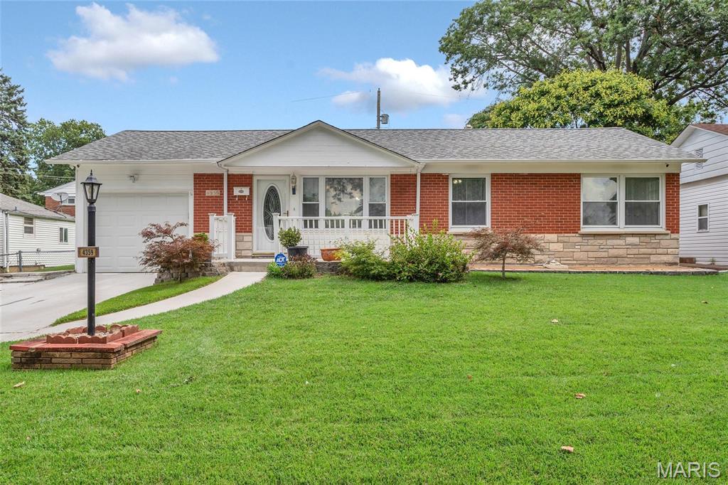 Super cute and clean!  3 bedrooms 2.5 baths. Front porch welcomes your friends and family into the living room with   wood floors. Modern kitchen with oak cabinets that boast glass doors.  Stainless appliances including the refrig.  Dining room offers wood floors and room to share a meal.  The primary bedroom includes 1/2 bath for convenience. Lower level in finished and bright.  Laundry room is large and bright.  Full bath is lovely.