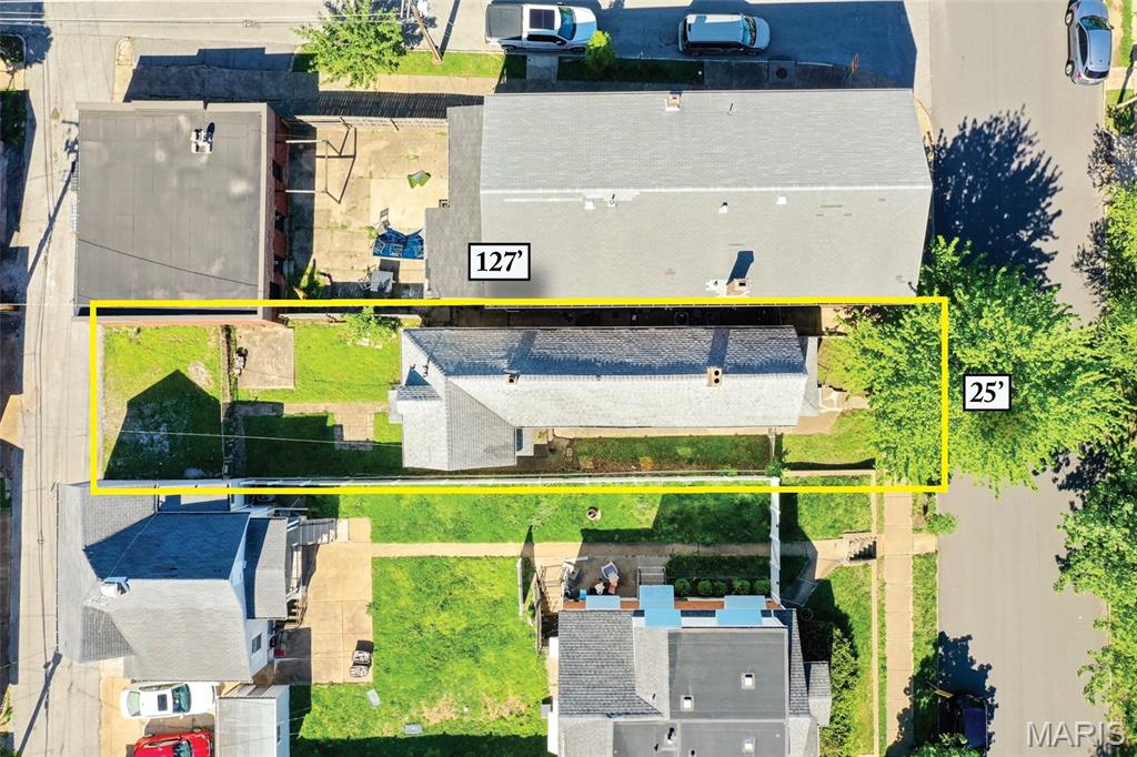 LOT FOR SALE! The existing house is currently uninhabitable. Rare opportunity to own one of the few available lots in this well-established, highly sought-after neighborhood. The level grade and back alley access make for a straightforward build, and the lot size is ideal for a smartly designed home that maximizes every square foot — perfect for a low-maintenance lifestyle without sacrificing style or location.
Situated a few blocks from The Hill, St. Louis's iconic 52-block Italian-American neighborhood, you'll have immediate access to one of the city's most authentic and beloved communities. Rooted in late 19th-century immigrant history, The Hill is home to generational family-owned restaurants like Zia's and Charlie Gitto's, beloved bakeries, specialty markets, and the landmark St. Ambrose Church. Streets adorned with Italian flag colors and the charming Piazza Imo plaza give the neighborhood a character and culture that is truly one of a kind — all just south of Forest Park near the highest point in the city.
Commuting and connectivity are a breeze with quick access to Highway 44 and downtown St. Louis. Opportunities to build new in a neighborhood this established and this close to everything don't last.