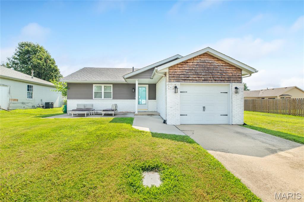 Adorable home in Bethalto School District!   This 3 bed/1bath home has been well cared for and it shows!  Step in and fall in love with the open floor plan with plenty of natural light!  Nice living room that opens to the kitchen with plenty of cabinetry, counter space and a pantry.  Step out from the kitchen to a nice patio and a great backyard that is fenced.  Perfect for privacy for kids and/or pets!  Extra deep 1 car garage is a bonus for additional storage.  The roof was replaced this year, so that is an added peace of mind for the new owner.  Be sure to schedule your appointment soon for a private showing!