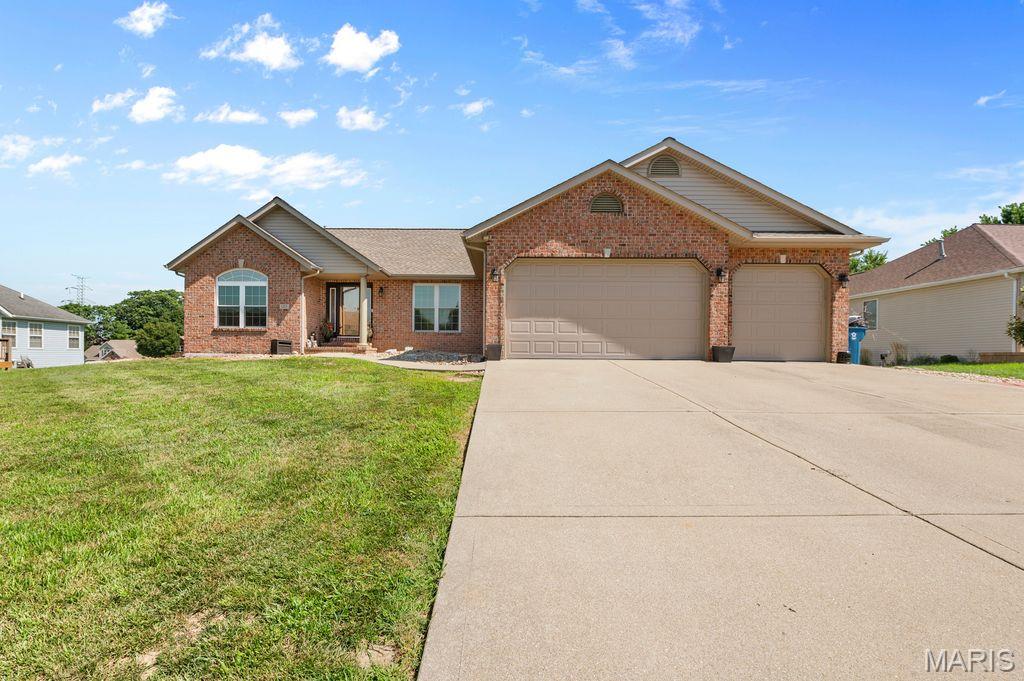 This move in ready ranch has room for everyone and everything! This 5-bedroom, 3-bath home with over 3900 sq ft blends easy one-story living with an exceptional finished walk-out lower level. An inviting open floor plan centers around a vaulted great room with fireplace flowing to the eat in kitchen with ample cabinetry and newer appliances are included. The separate formal dining room located off of the foyer is ready for all of your special gatherings. The split-bedroom design places the updated primary suite on its own wing featuring a large walk-in closet and a refreshed bath with separate soaking tub and shower. Two additional main-floor bedrooms and a full bath provide flexibility and privacy. The walk-out lower level expands your living space with a huge family room, second fireplace, kitchen/bar area (appliances stay), two more bedrooms, and a full bath—ideal for guests, hobbies, home office or game day. The screened-in porch located off the kitchen overlooks the fenced yard with two storage sheds and a hot tub that stays. A whole-house generator is also included that adds peace of mind. The three-car garage has plenty of space for vehicles, tools, and toys. The washer and dryer stay, too. Move-in ready with comfort and space in sought-after Keebler Oaks—schedule your showing today! Close to shopping, dining, schools, interstates and within 30 minutes of downtown St Louis.  Buyer to verify all information prior to making an offer.  Sellers are packing and moving so showings will start back up Monday July 24