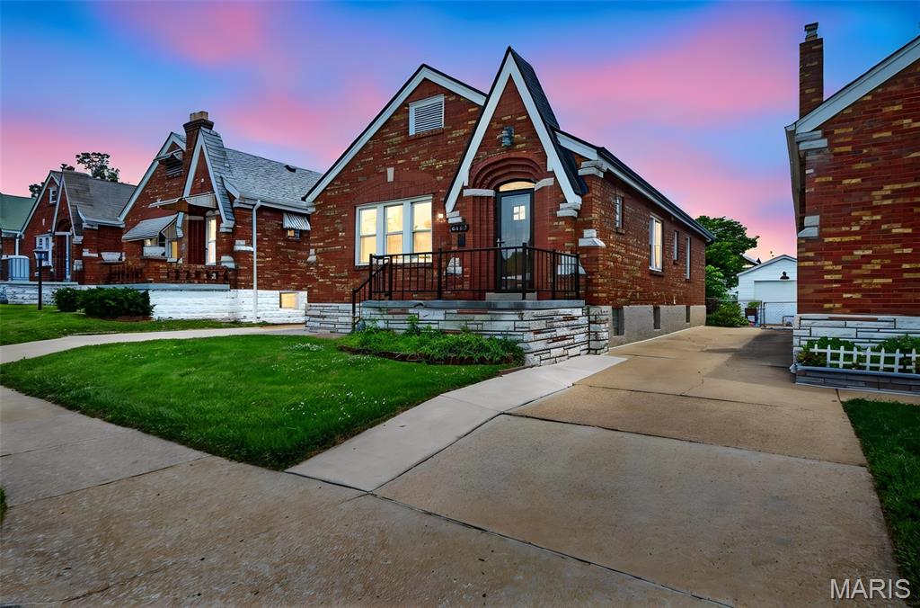 AFFTON CHARMER! This 2 bedroom, 1.5 bath bungalow is MOVE IN READY. The brick and stone elevation is timeless. As you walk in you are greeted with gleaming hardwood floors throughout. Big windows along every wall as you walk through to your separate dining room and into the updated kitchen (NEW COUNTERTOPS). Primary bedroom and secondary bedroom with a full bath finish off the main floor. Step out onto your enclosed sunroom for morning coffee or a nightcap. The finished LL adds more livable square footage w/ a rec room, sleeping (or flex) area and a half bath. Still plenty of room for storage, too. The VERY green and level backyard is spacious and ready for whatever you like to do outside. The oversized, detached one-car garage is big enough for your vehicle and extra storage. MAKE YOUR APPT TODAY! (ROOF/GUTTER 2024)