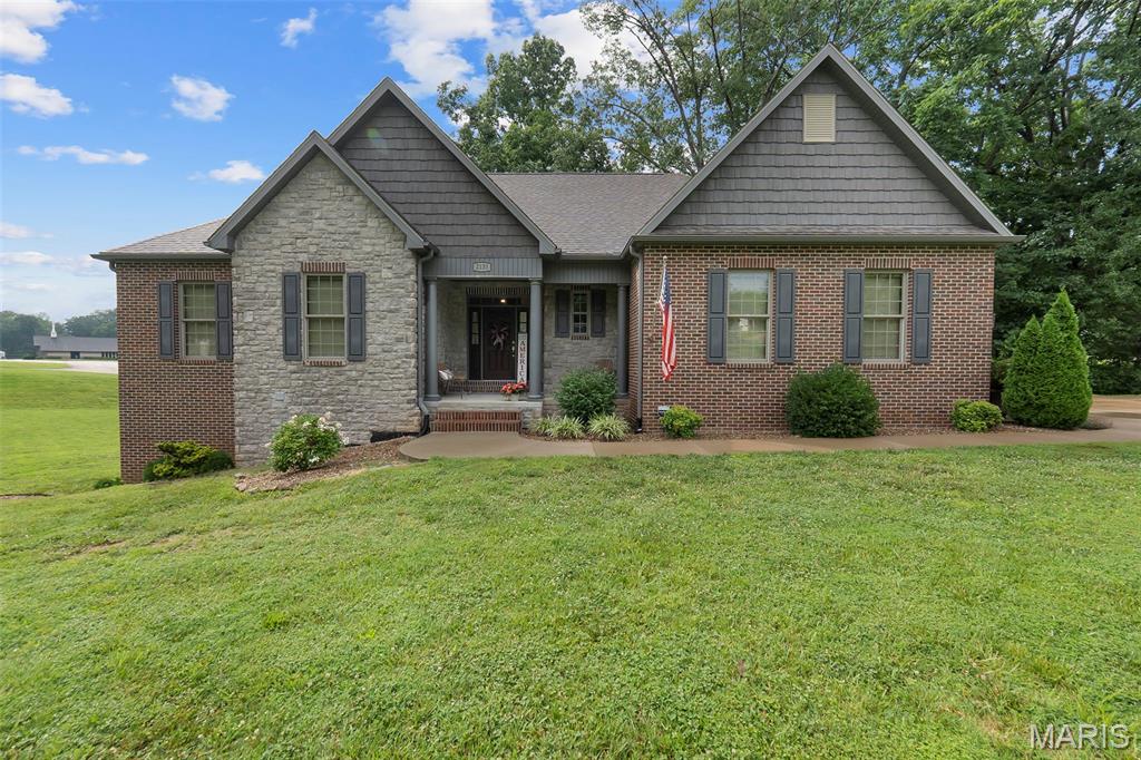 Situated on a large corner lot .87 acres at the intersection of Rampart and Lexington, on a cul-de-sac, this all-brick ranch offers an impressive amount of space, flexibility, and quality throughout. With 4 bedrooms, 3.5 bathrooms, and a versatile floor plan, this home is designed to accommodate a variety of lifestyles.

Inside, you'll find hardwood flooring, a beautifully updated kitchen featuring custom white cabinetry and quartz countertops, and comfortable living spaces perfect for both everyday living and entertaining. The oversized side entry garage includes a generous storage area, providing plenty of room for tools, equipment, and hobbies.

The walkout basement expands the living space with a large family room, additional bedroom, full bath, and a dedicated office that could easily serve as a fifth bedroom, guest room, or workout space.

Step outside to enjoy the covered patio and deck, where mature landscaping creates a shaded outdoor retreat throughout much of the day. Built with exceptional insulation and quality construction, this home offers a remarkably quiet and comfortable interior environment.

With a large lot, abundant living space, and a highly functional layout, this property delivers the room and flexibility today's buyers are looking for.