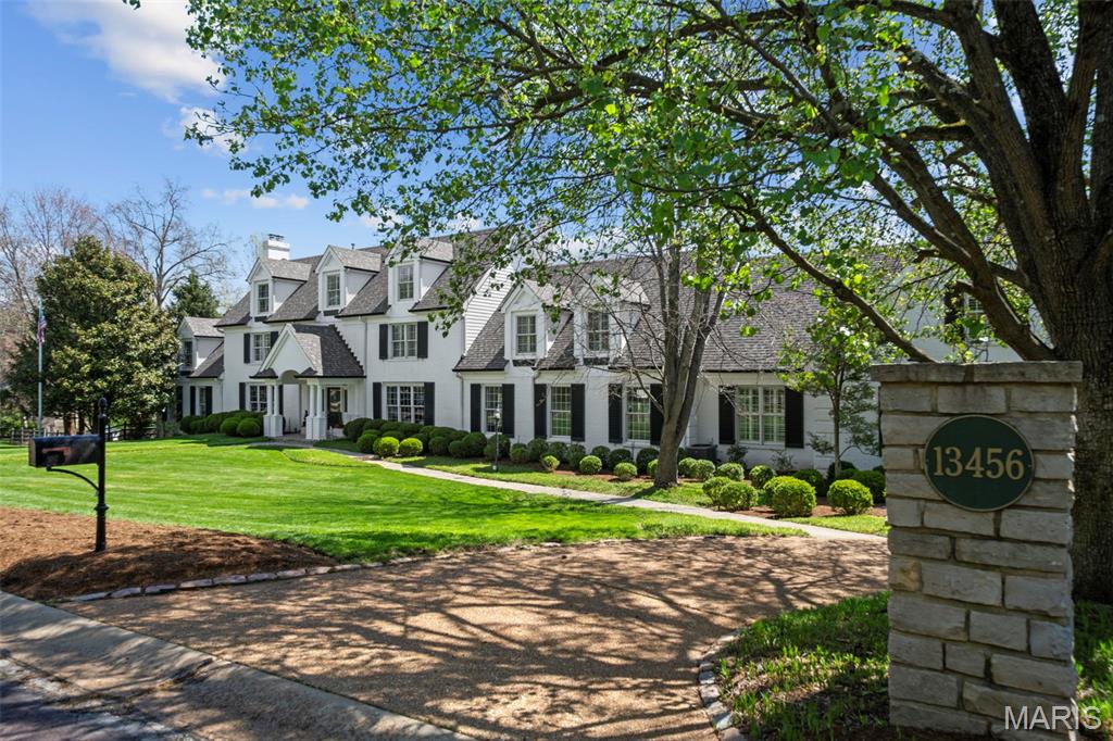 Enjoy gracious living in this exceptional estate set on park-like grounds with timeless architecture and seamless indoor-outdoor living. Expansive living spaces feature walls of windows and open effortlessly to a resort-style pool, covered loggia, and multiple outdoor entertaining areas. French doors open from the family room out to a private, retreat-like setting with the pool and spa, the full kitchen-equipped pool house, the shuffleboard court, and the beautiful stone fireplace. Impressive stone paths and broad steps lead out to the beautifully landscaped grounds with mature trees and lush lawns. Upstairs, well-appointed bedrooms offer both privacy and warmth, while the home’s overall layout reflects a rare balance of elegance and livability. Every detail—from the classic rooflines to the curated landscaping—contributes to a property that feels both refined and welcoming, while the thoughtful layout balances elegance with everyday livability. A rare opportunity to own a home designed for both grand entertaining and relaxed living—Elegant yet welcoming, refined yet livable—this is the kind of home people never want to leave!  Open sunday 4/26  from 1-3.