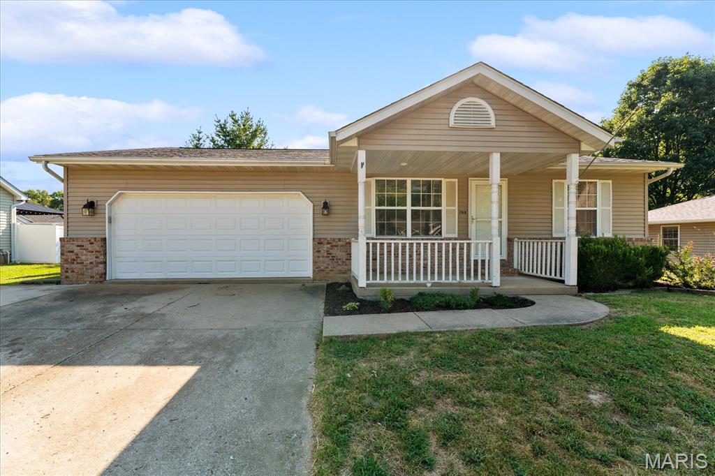 Welcome to this beautifully maintained 3-bedroom, 2-bath home offering approximately 2,076 sq. ft. of comfortable living space in the heart of Waterloo! From the moment you step inside, you’ll appreciate the inviting floor plan, impressive vaulted ceilings, and abundance of natural light that create a bright, open atmosphere perfect for everyday living and entertaining. The kitchen offers plenty of workspace and storage, with appliances included for added convenience. A finished basement expands the living space and provides endless possibilities for a family room, recreation area, home office, workout space, or hobby room, while still offering plenty of storage. Outside, the spacious fenced backyard is ready to enjoy, complete with established garden beds for those who love growing flowers, herbs, or fresh vegetables. An attached 2-car garage and oversized driveway provide excellent parking and additional flexibility for guests or extra vehicles. Location adds even more appeal! Enjoy Waterloo’s charming historic downtown with locally owned restaurants, shops, community events, festivals, and farmers' market. Offering small-town charm with convenient access to the St. Louis metropolitan area, this well-cared-for home delivers the space, storage, outdoor living, and location today’s buyers are searching for. Schedule your private showing and discover everything 708 S Library has to offer!