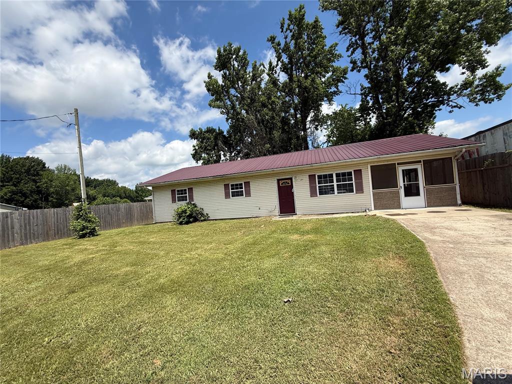 Investor special! This 3-bedroom, 2-bathroom single-level home offers 1,305 square feet of living space and plenty of potential for renovation. Featuring a functional floor plan, spacious living area, and a screened carport, this property is ready for updates and improvements. The level lot provides additional opportunities for landscaping and outdoor enhancements. Whether you're looking for your next flip, rental investment, or a home to customize and build equity, this fixer-upper presents an excellent value-add opportunity. Conveniently located with easy access to local amenities, 124 County Road 306 is ready for a new owner with vision and creativity.