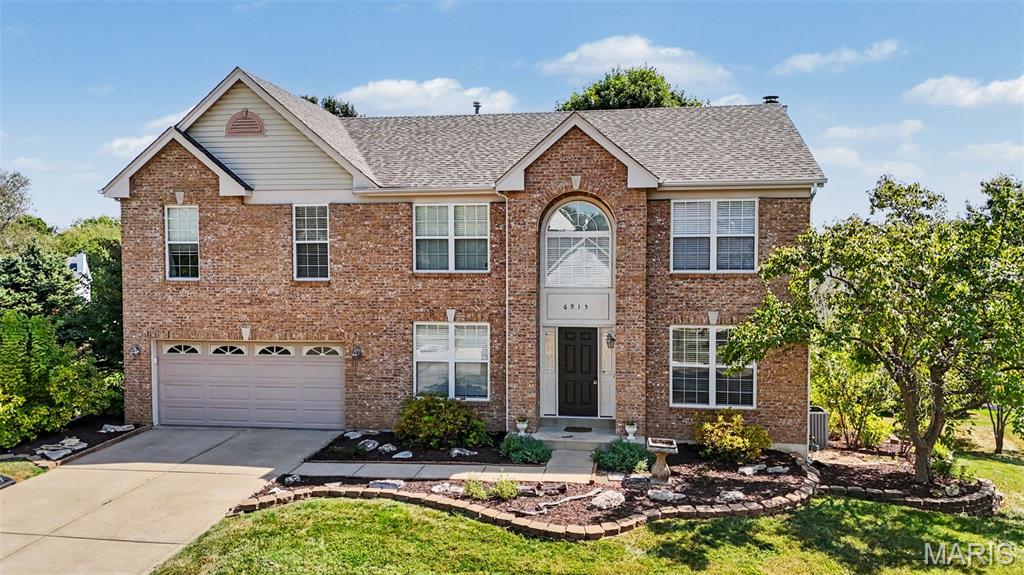 Welcome to a fresh opportunity in the highly desirable Fieldstone Farms neighborhood of O’Fallon! Thoughtfully designed for comfortable living and effortless entertaining, this spacious two-story home offers the versatility, room to grow, and everyday convenience today’s buyers are looking for. With a NEW ROOF INSTALLED IN 2026, this home delivers an important recent improvement and added peace of mind for its next owners.  Step inside to a welcoming main level featuring a dedicated home office with French doors, an inviting dining room, and a generously sized family room anchored by a cozy fireplace. Whether hosting gatherings or enjoying quiet evenings at home, these spaces offer the perfect balance of functionality and comfort. The eat-in kitchen provides ample room for meal preparation and casual dining, while the adjacent main-floor laundry room adds everyday convenience. A half bath completes the main level.  Upstairs, the split-bedroom layout provides a private primary retreat separate from the additional bedrooms. The spacious primary suite offers a comfortable place to unwind, while three additional bedrooms and two full bathrooms provide plenty of flexibility for family, guests, or personal space.  The finished walk-out lower level expands the possibilities even further. Featuring a recreation room, bar area, full bathroom, and a versatile fifth bedroom, this level is ideal for entertaining, multigenerational living, a guest suite, home gym, media room, or additional office space. With a separate entrance and potential kitchenette area, the lower level offers exceptional adaptability to suit a variety of lifestyles. Abundant storage throughout the home helps keep daily living organized.  Outdoor living is equally appealing, with a deck overlooking the backyard, a concrete patio below, a charming koi pond, and established perennial landscaping that adds character and seasonal beauty. The corner lot provides a welcoming setting within the neighborhood, while the community pool offers an additional amenity to enjoy.  Conveniently located near Highway 40, shopping, dining, entertainment, and everyday essentials, this home combines space and flexibility with an ideal O’Fallon location. Situated in the sought-after Francis Howell School District, this is a wonderful opportunity to make a spacious, versatile home your own. Come experience everything this property has to offer!