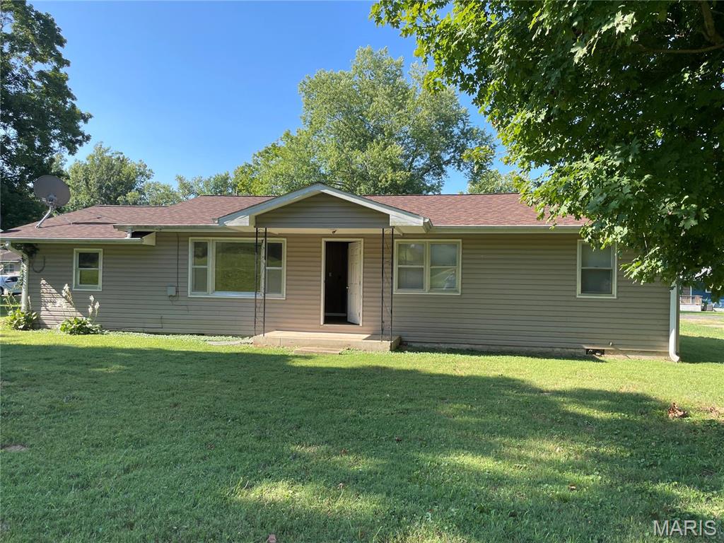 Vinyl sided home located on a nice, level lot on dead-end street. Home boast new shingled roof, new paint and flooring. Living room, eat-in kitchen with appliances, large bonus room with storage, 3-bedrooms, 1-bathroom and laundry area. Great first home.