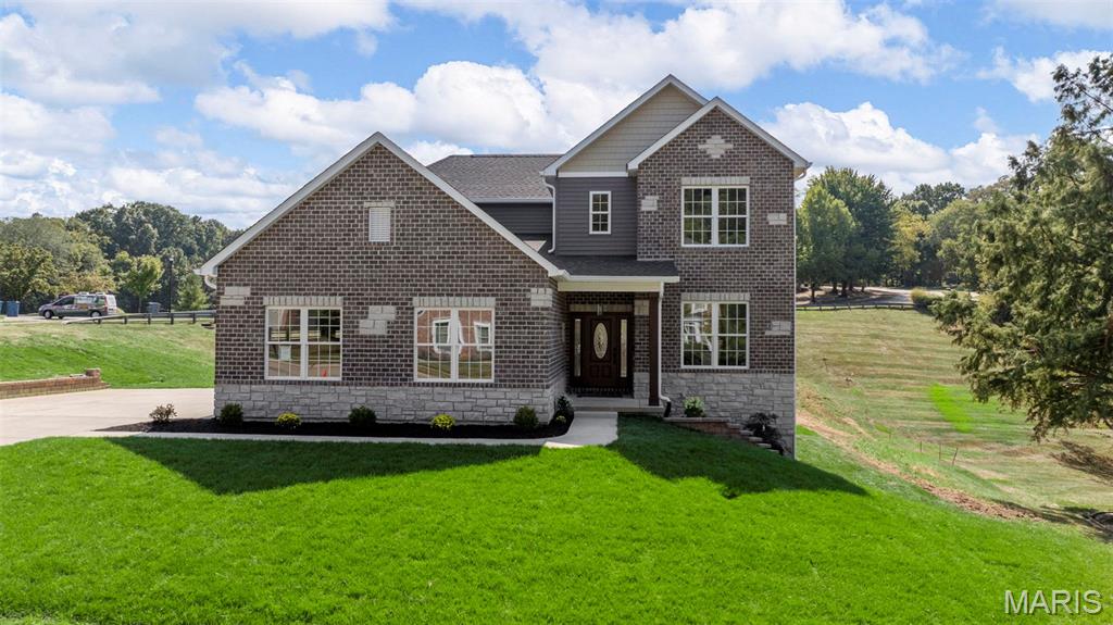 This exquisite newly built. 1.5 Story home 0.72 Acres in Chesterfield! 5 Beds & 4 1/2 Baths with a 3 Car side-entry, blends elegance and comfort! Features a breathtaking window wall, 9ft ceiling throughout, and Hardwood flooring throughout the main level. The gourmet kitchen boasts white shaker cabinets, Quartz countertops, a large Mocha Island & D-bar, and SS appliances cooktop & double oven. Retreat to the main-level master suite w dual walk-in closets & a spa-like bath featuring a soaking tub, walk-in shower, and dual vanities. Upstairs 3 Bed & bath, while a third enjoys a private bath & walk-in closet. a spacious loft, additional highlights include a dual-zone HVAC, main-floor laundry with cabinets, and stylish interior paint.
Situated on a generous 0.72 Acre lot in Wildhorse subdivision, this home offers plenty of outdoor space to enjoy. Across the street the neighborhood pool, tennis/basketball court and the neighborhood lake. additional rooms: workshop/Hobby are