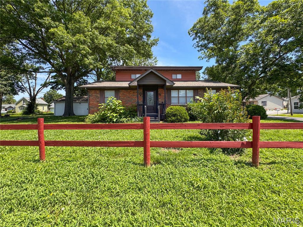 This all-brick corner-lot bungalow simply oozes charm from the moment you pull up, with its storybook exterior and a top-to-bottom interior remodel that blends modern comfort with classic character. The location couldn’t be more convenient, sitting right at the corner of Highland Street for an easy commute while still feeling tucked into a friendly neighborhood. Step inside and you’ll immediately notice the care and craftsmanship that went into refinishing this home. A handy side entrance opens into a bright mudroom with a drop zone and LVP flooring, leading to a dedicated laundry room—beautifully finished, neatly enclosed with a two-panel door, and best of all, right on the main floor.

The open layout brings the living, dining, and kitchen spaces together in a way that feels both airy and cozy. The kitchen shines with its large farm sink, stainless appliances, recessed lighting, 42” shaker cabinets, trending black accents, marble window sills, and durable LVP flooring. A leaded-glass back door adds a touch of vintage charm. The living room’s oversized triple window floods the space with natural light and creates the perfect spot to showcase your holiday decor.

The PRIMARY main-floor bedroom offers a comfortable room with LVP flooring, a double closet, and LED lighting. A second main-floor bedroom with matching finishes sits near the centrally located full bath with a tub/shower combo and single vanity. Upstairs, you’ll find a second MASTER SUITE beautifully finished bedroom with 2” blinds, LVP flooring, and a spacious landing accented by aluminum spindle railing and a board-and-batten stairwell. The upstairs bathroom is impressively large, featuring LVP flooring, niche storage, a double-size vanity, and a corner shower. The second master suite on this level offers even more space, complete with LVP flooring and an extra-deep closet.

This home has great storage! The DRY lower level adds flexibility with a third shower if needed and a second washer/dryer hookup. You could also finish this level for additional living space. 

Outside, the generous side yard gives you plenty of room to entertain, garden, or simply relax and enjoy the charm this home radiates from every angle.  This home is ready to go and will accommodate a fast closing!