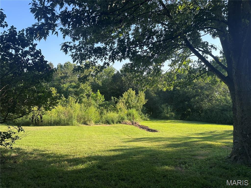 3.05-acre property offering a unique opportunity for renovation, redevelopment, or new construction. Existing home is in poor condition and will require extensive rehabilitation, likely to the studs, or may be best suited for removal. Property also includes an existing shop, adding additional utility and potential to the property. Property is being offered primarily for the land and its potential. Buyers should conduct their own due diligence regarding the existing structures, utilities, zoning, septic/well, and feasibility of renovation or replacement. Sold AS-IS.