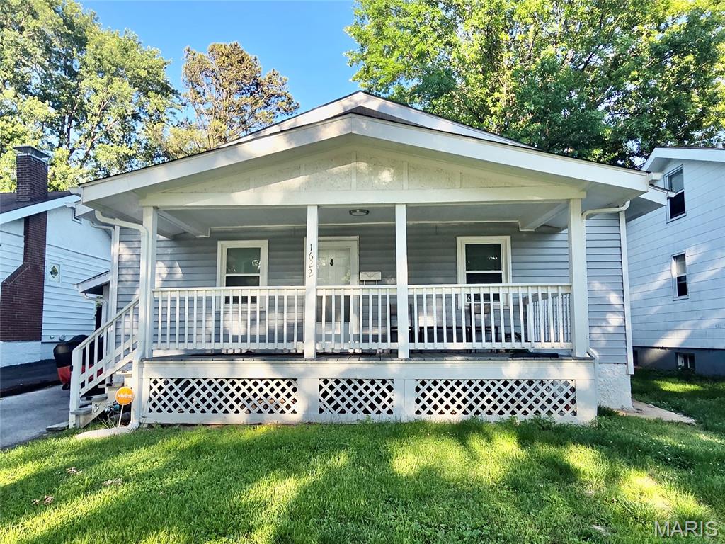 DO NOT DISTURB TENANT Opportunity to add income producing rental to your portfolio! With a large fenced yard, 1 car attached garage and unfinished walkup basement with laundry hookups and sump pump/pit this updated 2 bed 1 bath University City home is leased for $1375 per month through 7/31/2027. No showings without accepted contract